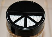 A Black Color Cap of a Culture Jar